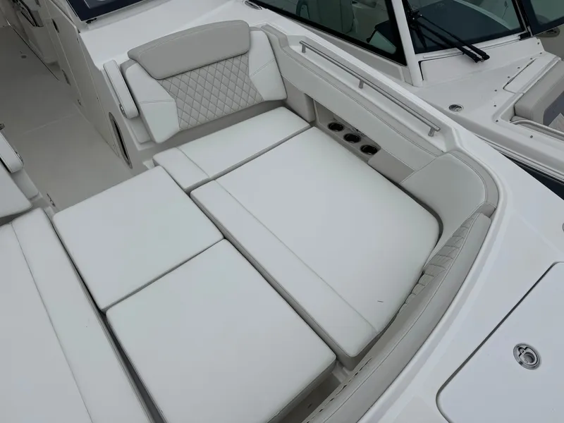 Slide: The Image of Luxurious seating in World Cat 325DC boat, model 2026. - 4
