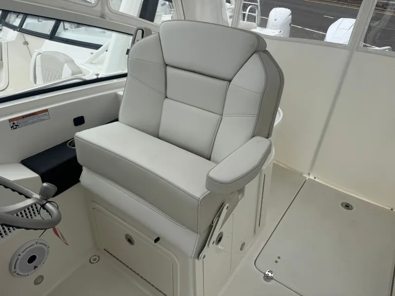 Slide: The Image of Luxurious seating in World Cat 325DC boat, model 2026. - 9