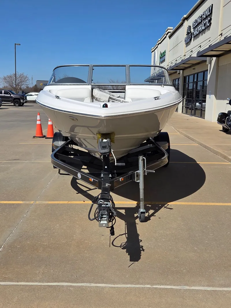 Slide: The Image of 2019 Regal 1900 ES Bowrider on trailer outside store. - 3