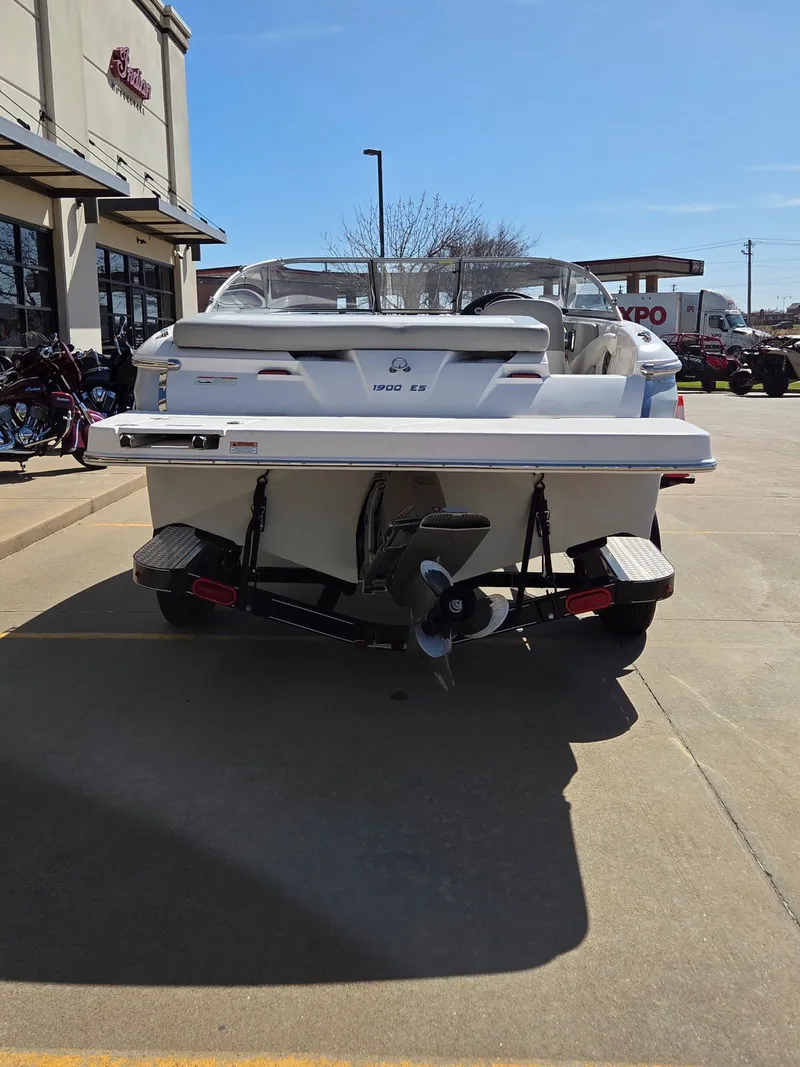 Slide: The Image of Rear view of a 2019 Regal 1900 ES Bowrider on a trailer. - 7