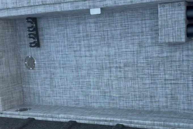 Slide: The Image of Interior view of 2026 Princecraft Ventura 224 boat with textured flooring and storage compartments. - 15