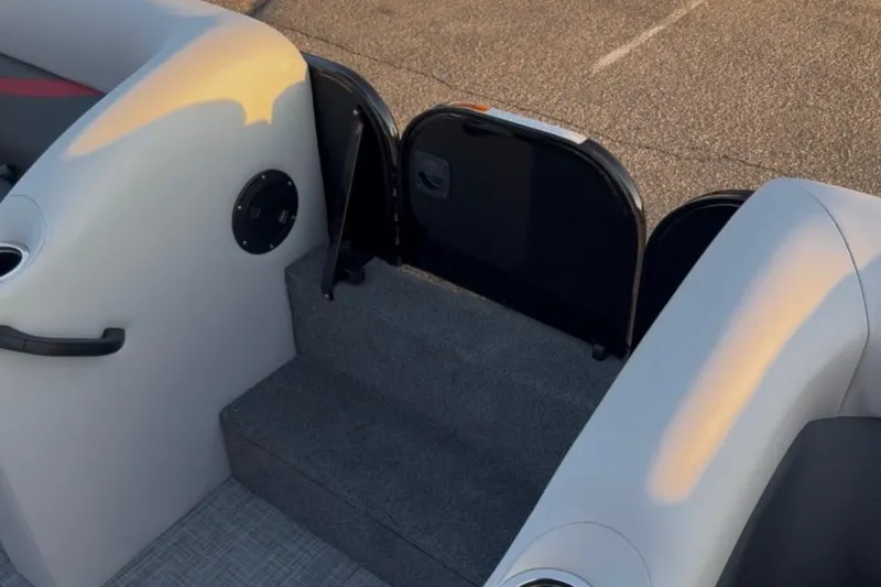 Slide: The Image of Interior view of 2026 Princecraft Ventura 224 boat, featuring seating and entry steps. - 16