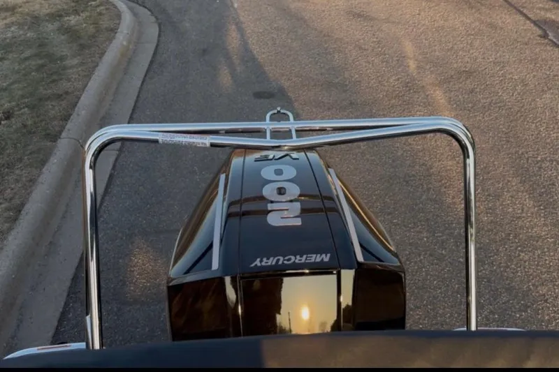 Slide: The Image of 2026 Princecraft Ventura 224 with Mercury 200 engine on a road. - 18