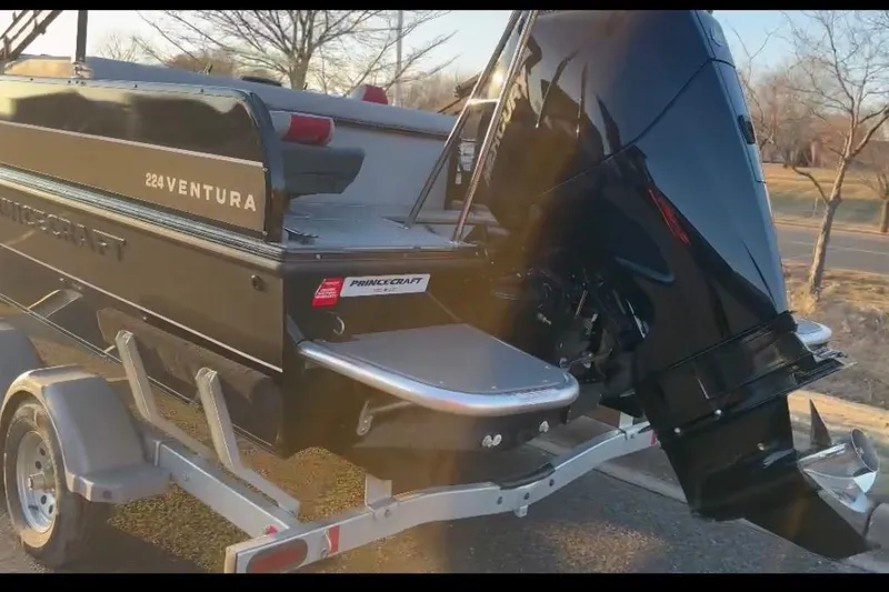Slide: The Image of 2026 Princecraft Ventura 224 boat on trailer, rear view with outboard motor. - 3
