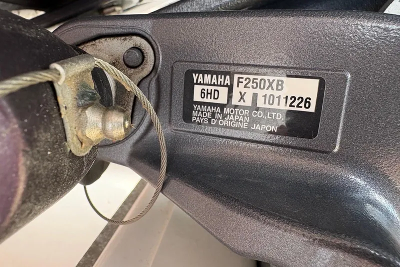Slide: The Image of Yamaha F250XB engine label on 2023 Sportsman Open 232 Center Console boat. - 16