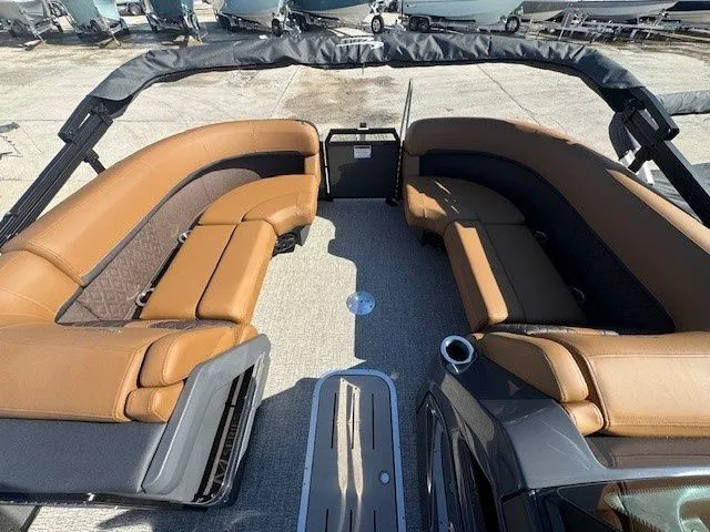 Slide: The Image of Interior of 2026 Bennington 23MSB with luxurious leather seating. - 11