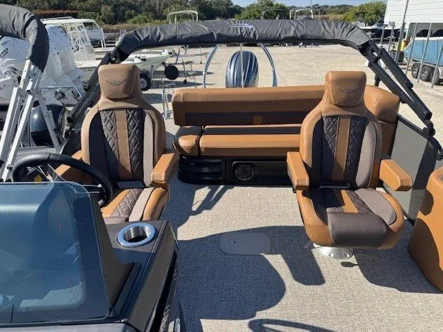 Slide: The Image of Interior of a 2026 Bennington 23MSB boat with luxurious seating. - 15