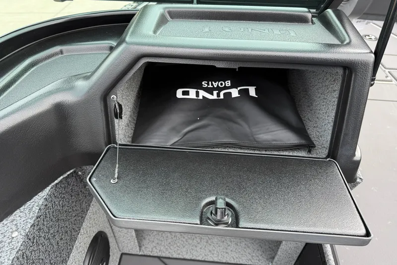 Slide: The Image of Storage compartment of 2026 Lund 1775 Impact XS Sport boat with branded bag inside. - 21
