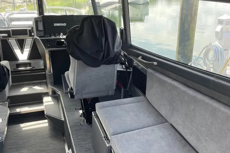 Slide: The Image of Interior of a 2021 Viggo C10 boat with seating and navigation equipment. - 17