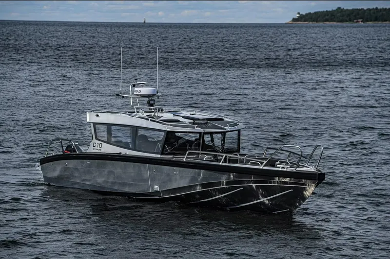 Slide: The Image of 2024 Viggo C10 boat on open water, showcasing sleek design and advanced technology. - 19