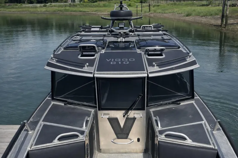 Slide: The Image of 2024 Viggo C10 boat on calm water, showcasing sleek design and modern features. - 3