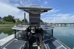 Slide: The Image of Modern 2021 Viggo C10 boat with sleek design docked by a serene waterfront. - 4