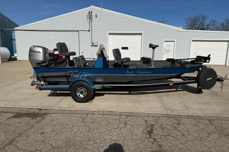 Slide: The Image of 1997 Tuffy 1700 ESOX MAGNUM fishing boat with Honda motor on trailer. - 5