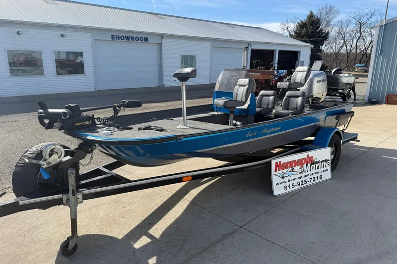 Slide: The Image of 1997 Tuffy 1700 ESOX MAGNUM fishing boat on trailer outside showroom. - 8