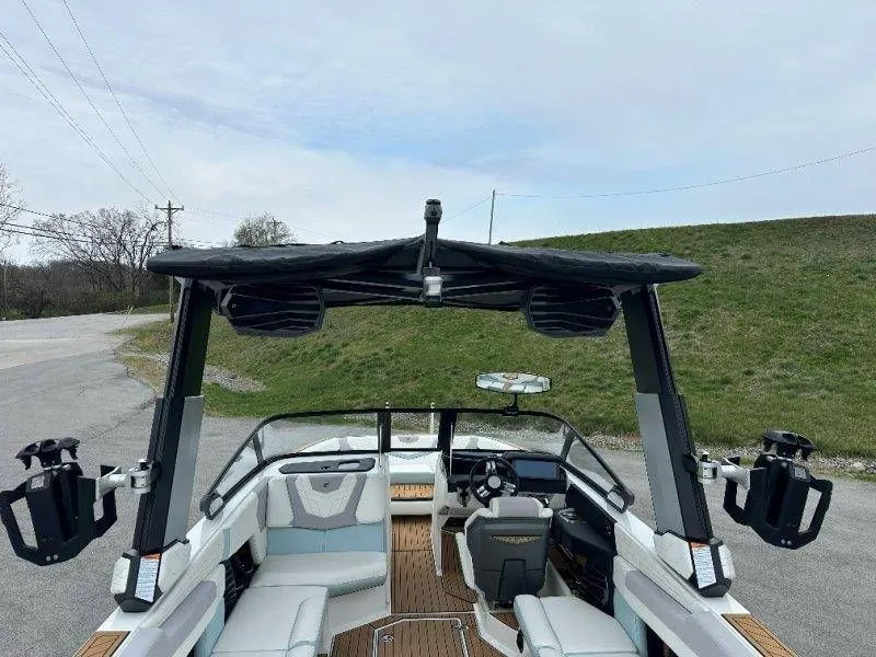 Slide: The Image of Interior view of a 2022 Nautique G23 boat with modern features. - 11