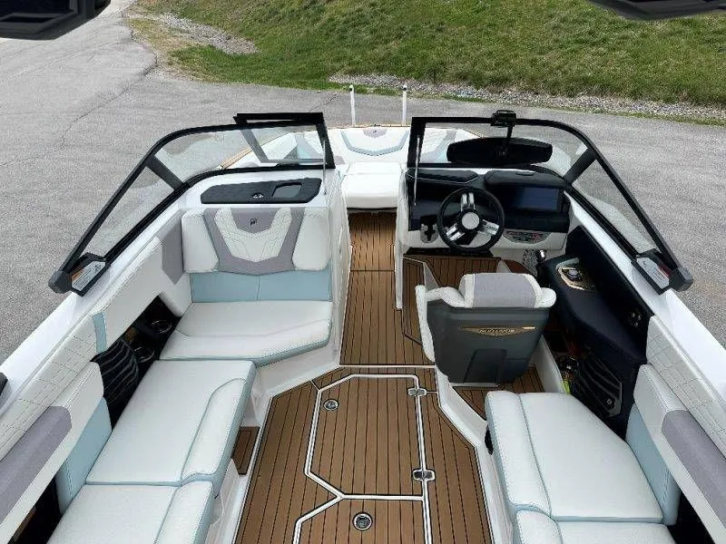 Slide: The Image of Interior of a 2022 Nautique G23 boat with luxurious features. - 23