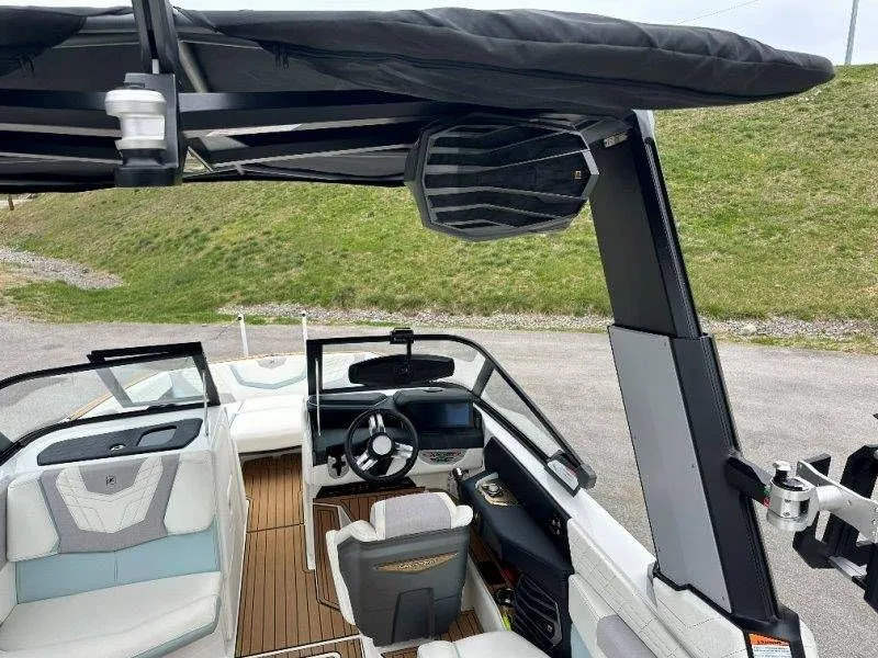 Slide: The Image of Interior view of a 2022 Nautique G23 boat with modern design. - 30