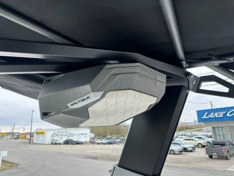 Slide: The Image of Nautique G23 2022 speaker mounted on boat roof. - 35