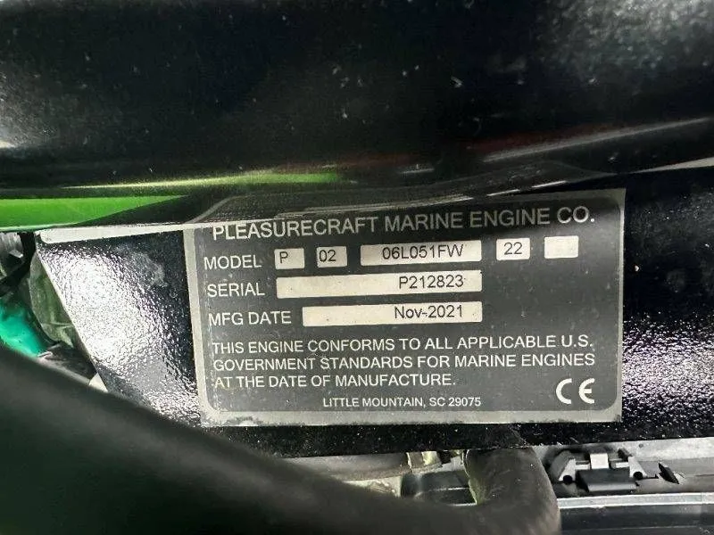 Slide: The Image of Pleasurecraft Marine Engine Co. nameplate, Model P, Serial P212823. - 38