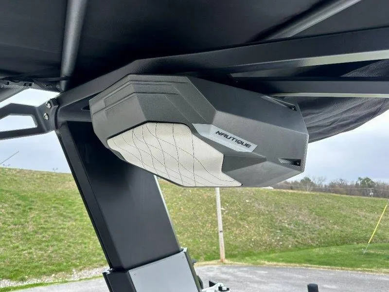Slide: The Image of Nautique G23 2022 speaker under boat canopy. - 47