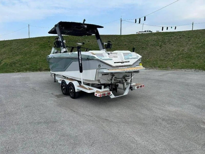 Slide: The Image of 2022 Nautique G23 boat on trailer, rear view. - 5