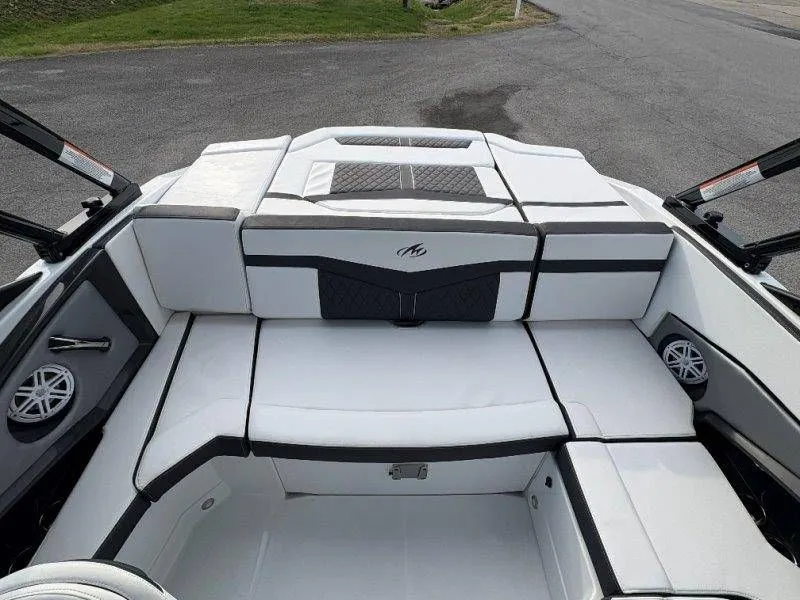 Slide: The Image of Interior of 2023 Monterey 218SS Super Sport boat, white upholstery. - 12