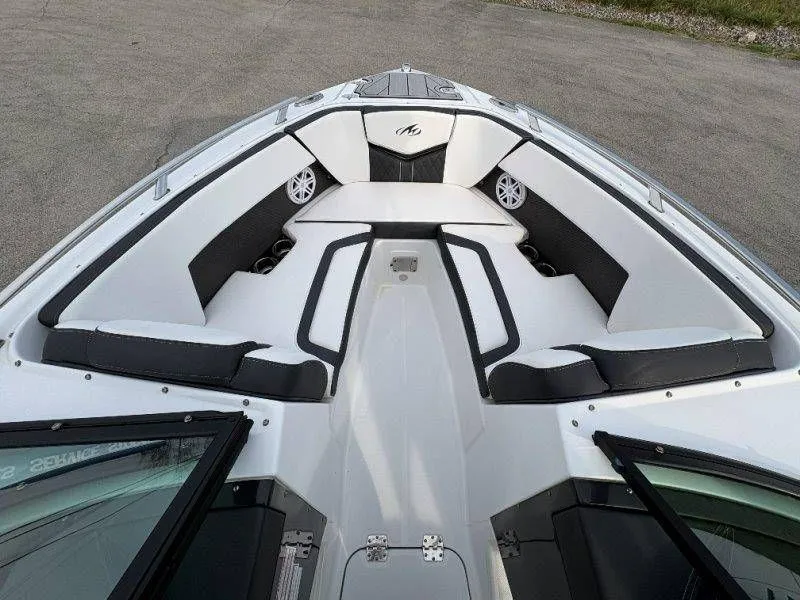 Slide: The Image of Interior of 2023 Monterey 218SS Super Sport boat, white and black upholstery. - 14