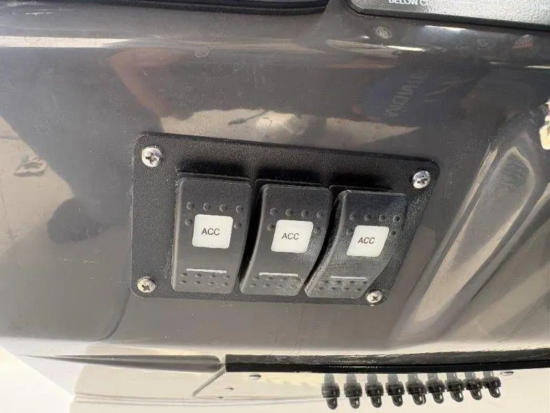 Slide: The Image of Switch panel of 2023 Monterey 218SS Super Sport with three ACC switches. - 39