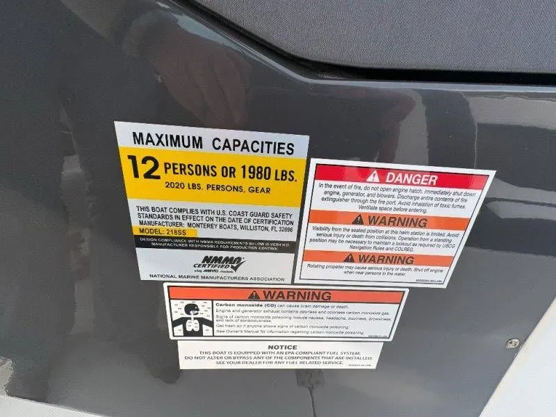 Slide: The Image of Safety and capacity labels on a 2023 Monterey 218SS Super Sport boat. - 41