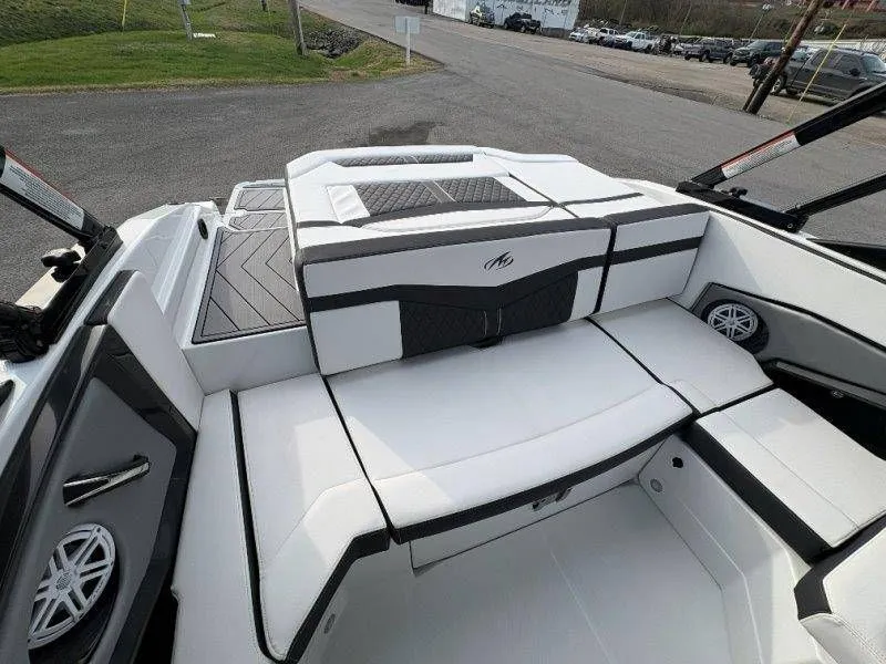 Slide: The Image of 2023 Monterey 218SS Super Sport boat interior with white seating. - 44