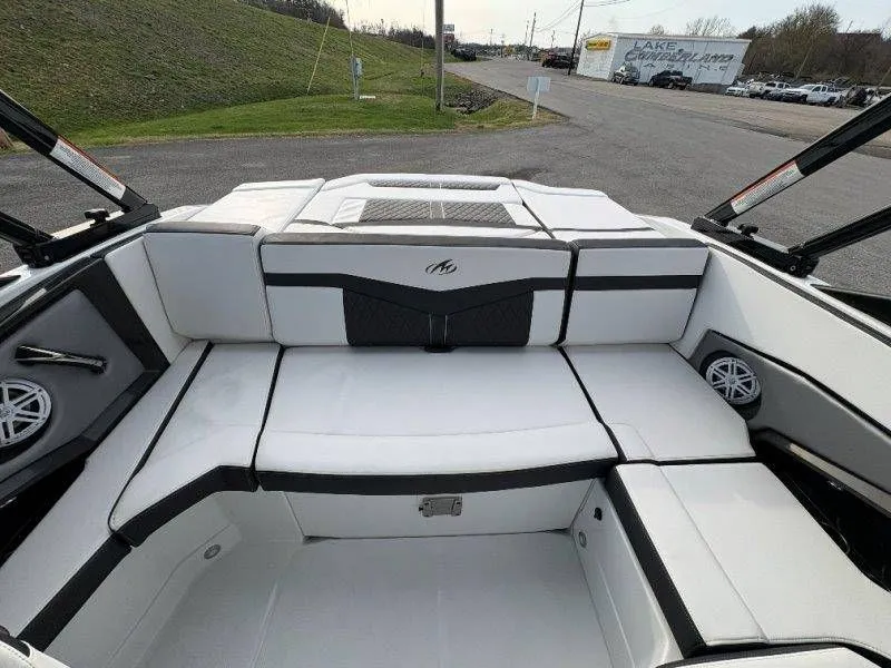 Slide: The Image of Interior of 2023 Monterey 218SS Super Sport boat, white and black upholstery design. - 46