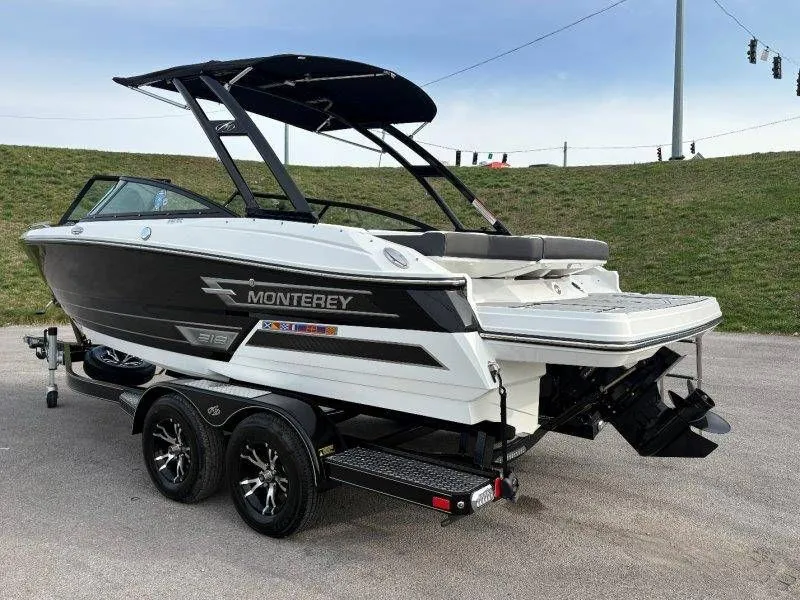 Slide: The Image of 2023 Monterey 218SS Super Sport boat on trailer, side view. - 8