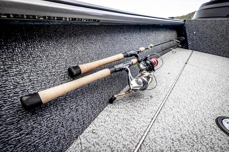 Slide: The Image of Manufacturer Provided Image: Fishing rods on 2025 Lund 1775 Impact XS Sport boat deck. - 10