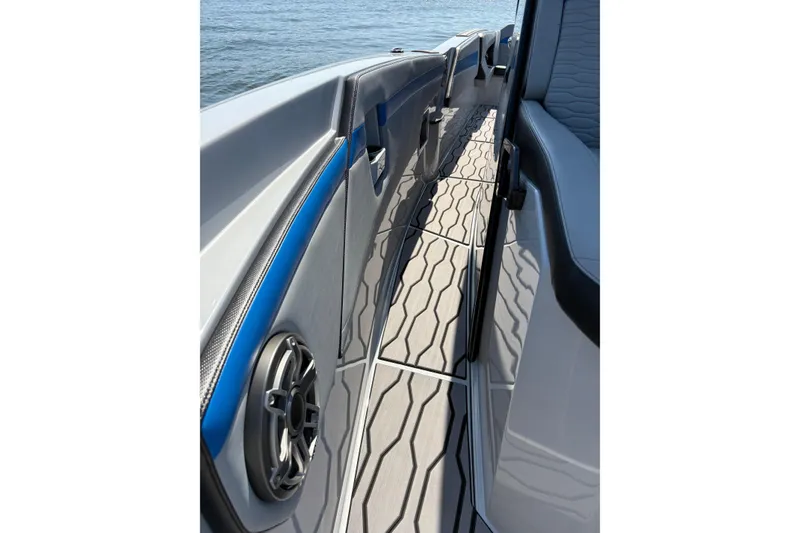 Slide: The Image of 2024 Sunsation 32 CCX boat deck with sleek design and modern detailing. - 25