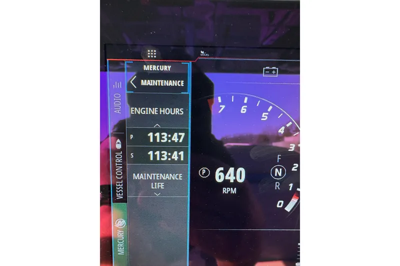 Slide: The Image of Dashboard of 2024 Sunsation 32 CCX showing engine hours and RPM. - 5