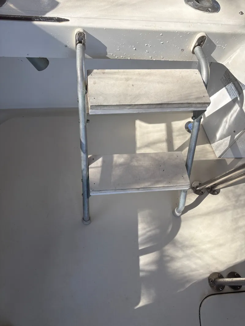 Slide: The Image of Ladder on a 1983 Mainship 34 Mark III boat. - 12