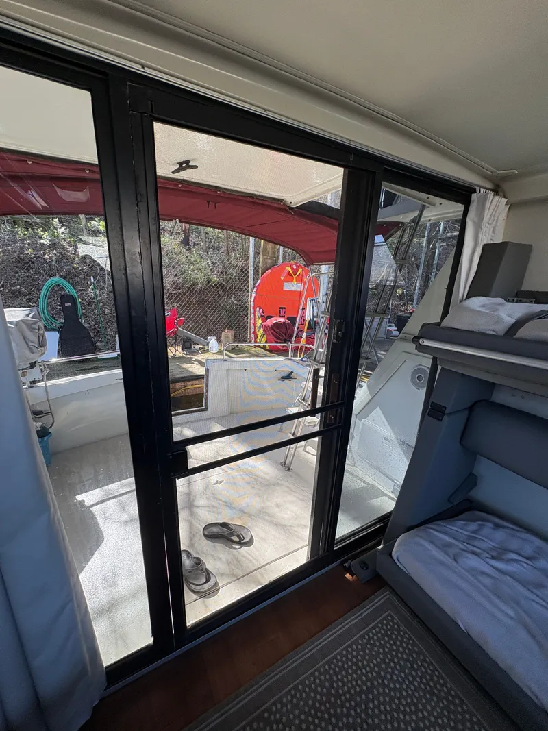 Slide: The Image of Interior of a 1983 Mainship 34 Mark III with sliding door. - 35