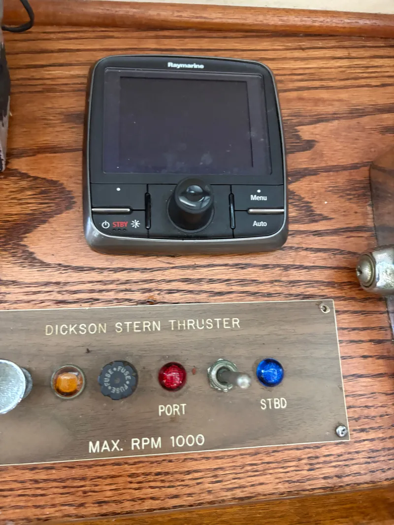 Slide: The Image of 1983 Mainship 34 Mark III control panel with Raymarine device. - 40