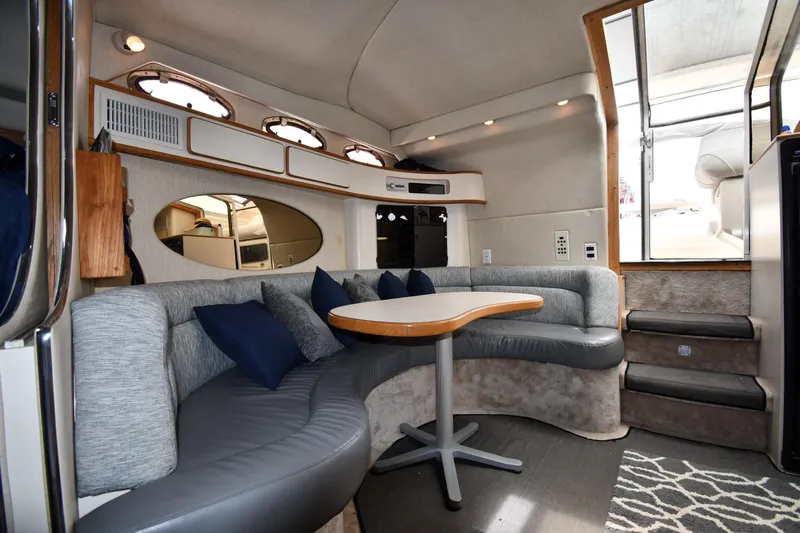 Slide: The Image of Luxurious interior of 1994 Sea Ray 400 Express Cruiser with plush seating and elegant design. - 33