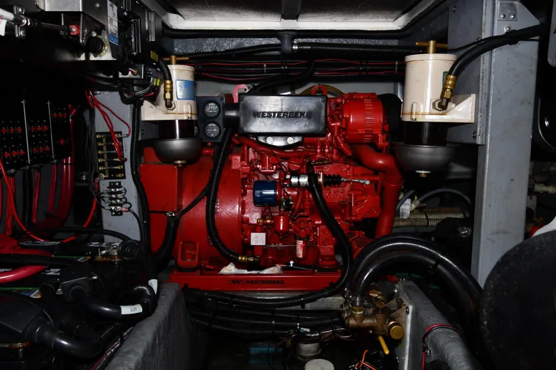 Slide: The Image of Engine room of a 1994 Sea Ray 400 Express Cruiser with Westerbeke generator. - 45