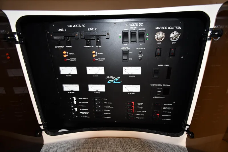 Slide: The Image of Electrical control panel of a 1994 Sea Ray 400 Express Cruiser boat. - 41