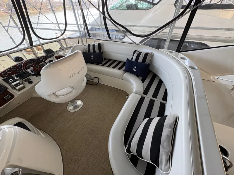 Slide: The Image of Interior of a 2007 Meridian 459 Motoryacht with elegant seating arrangement. - 10