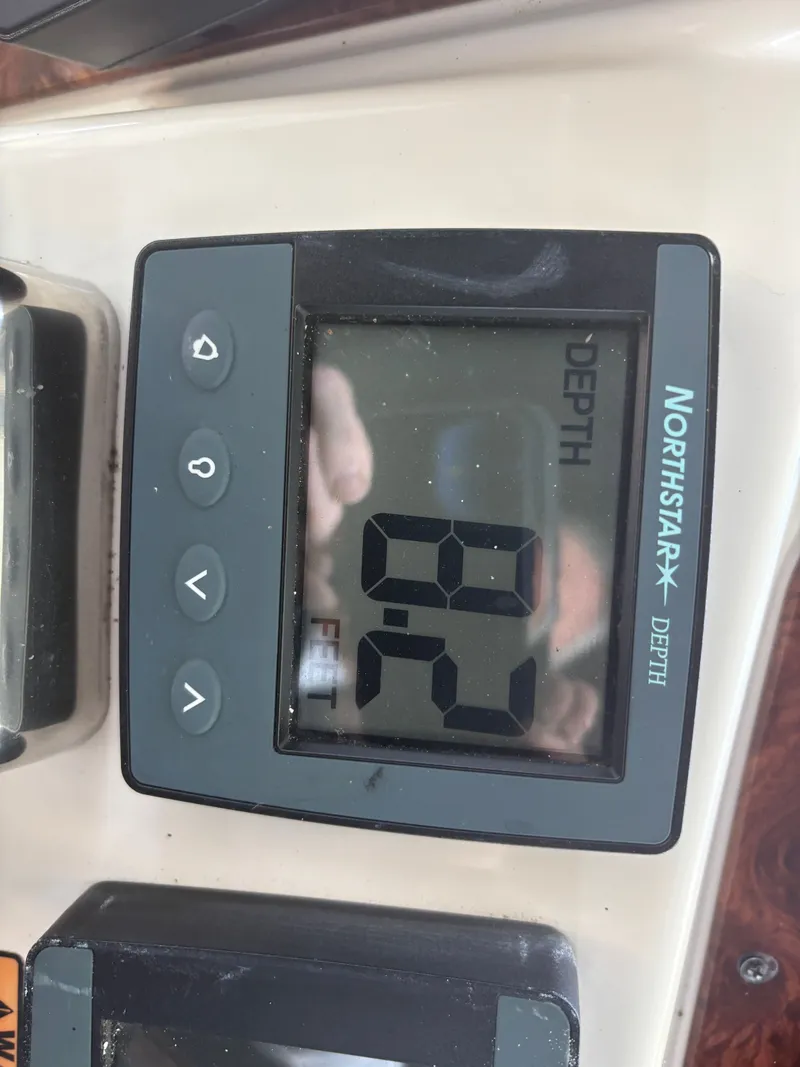 Slide: The Image of Depth gauge on Meridian 459 Motoryacht, displaying 92 feet. - 14