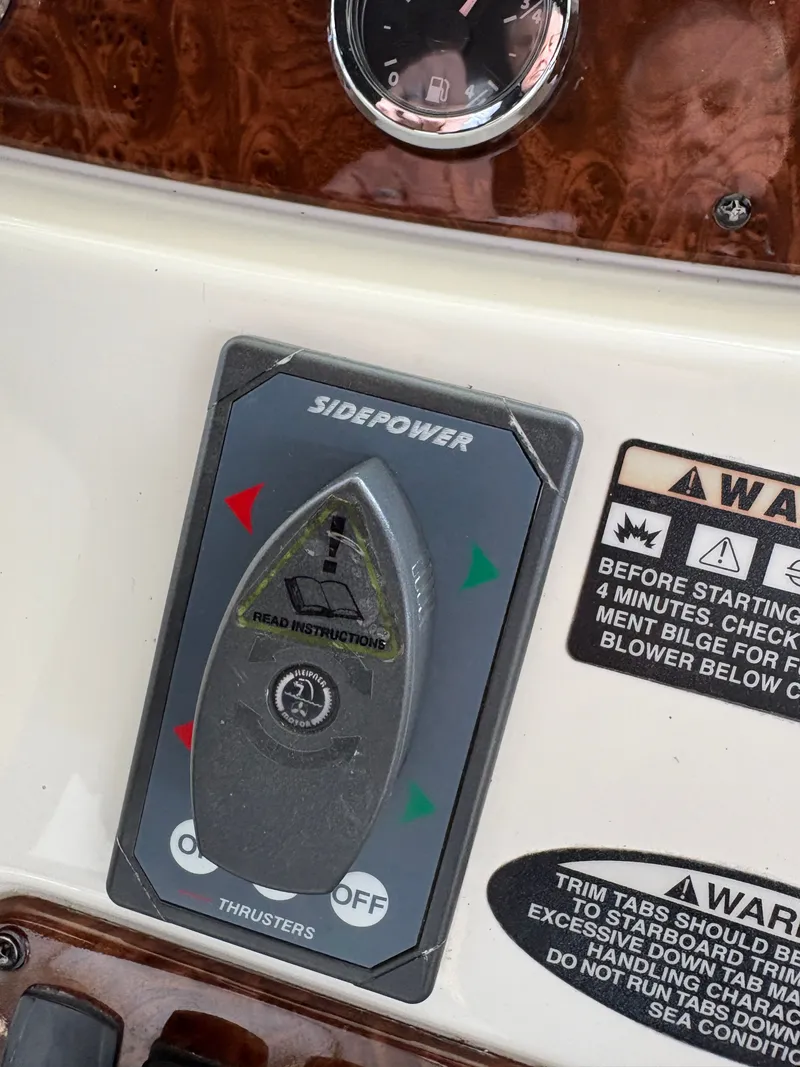 Slide: The Image of Meridian 459 Motoryacht control panel with Sidepower thruster controls. - 15