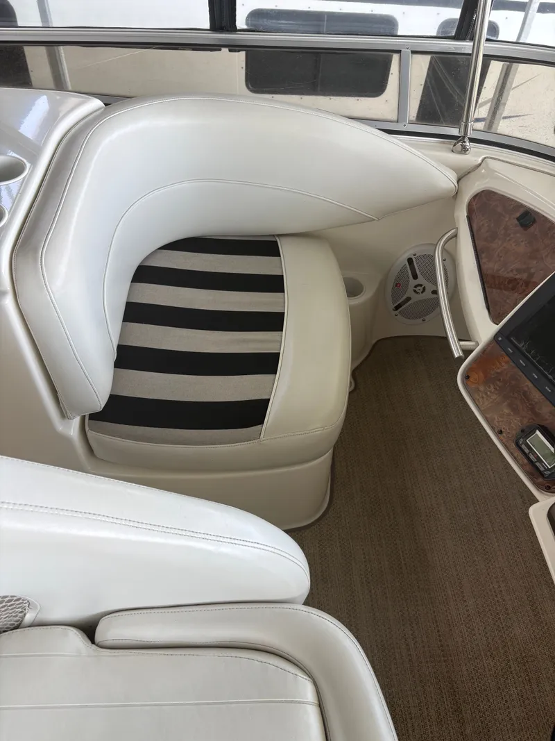 Slide: The Image of Interior of a 2007 Meridian 459 Motoryacht with white seating. - 16