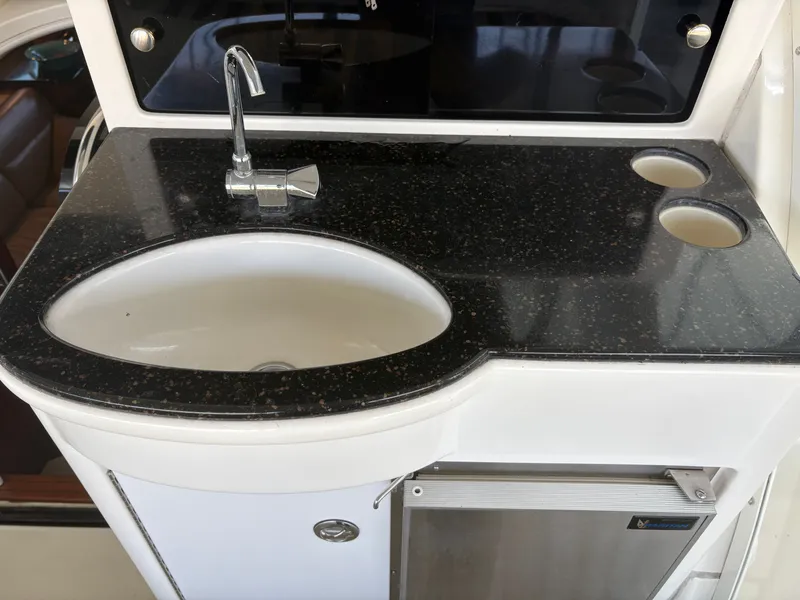 Slide: The Image of Galley on 2007 Meridian 459 Motoryacht with sink and faucet. - 22