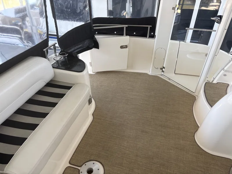 Slide: The Image of Interior of 2007 Meridian 459 Motoryacht with seating area. - 23