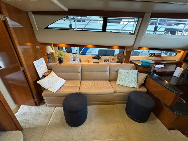 Slide: The Image of Interior of a 2007 Meridian 459 Motoryacht with leather sofa and decor. - 31