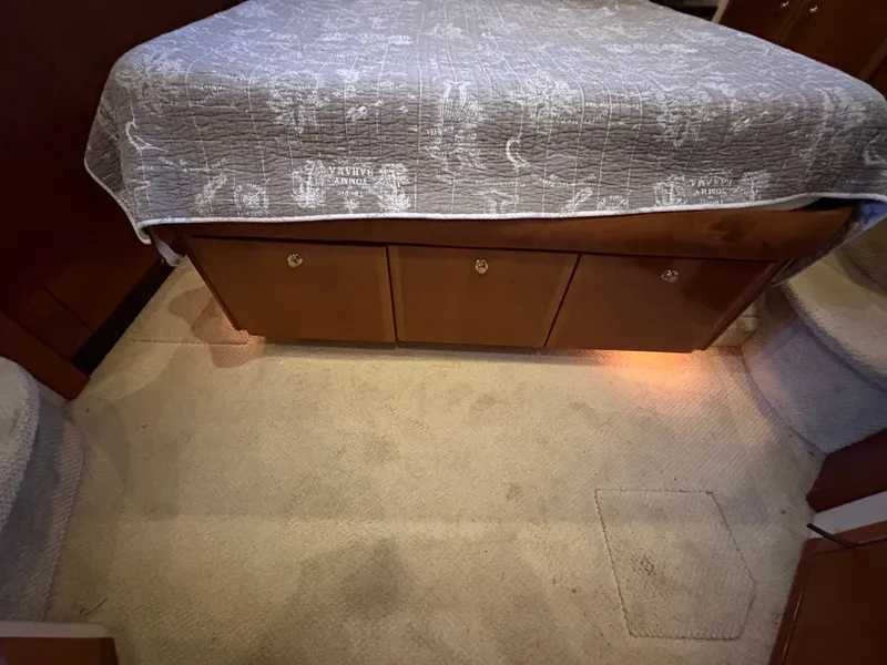 Slide: The Image of Interior of 2007 Meridian 459 Motoryacht with bed and storage. - 42