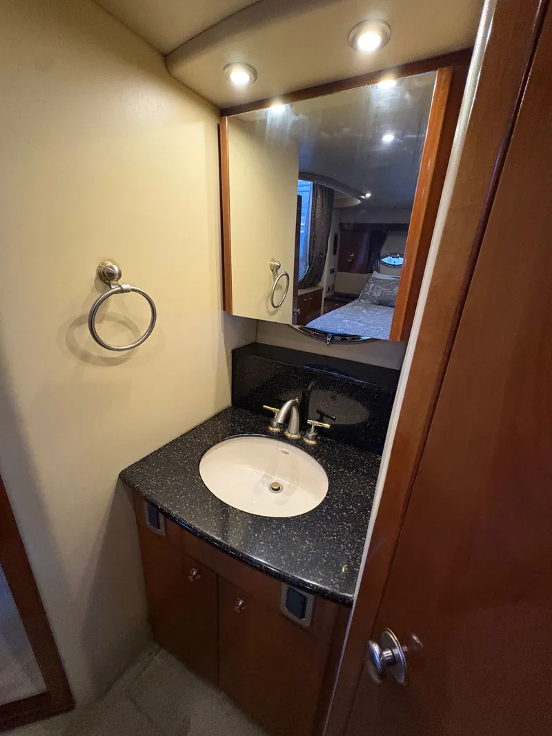 Slide: The Image of Bathroom in 2007 Meridian 459 Motoryacht with sink and mirror. - 48